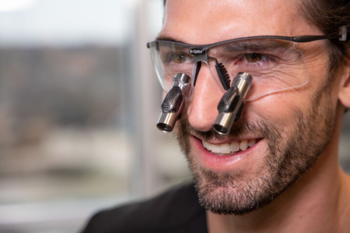Dental professional wearing Q-Optics Prismatic loupes